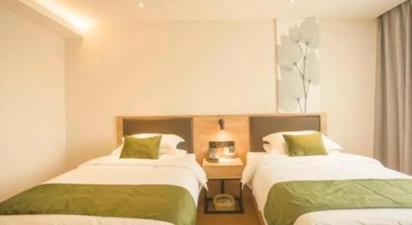 Bed in GreenTree Inn Express Taizhou Jiangyan Hardware City