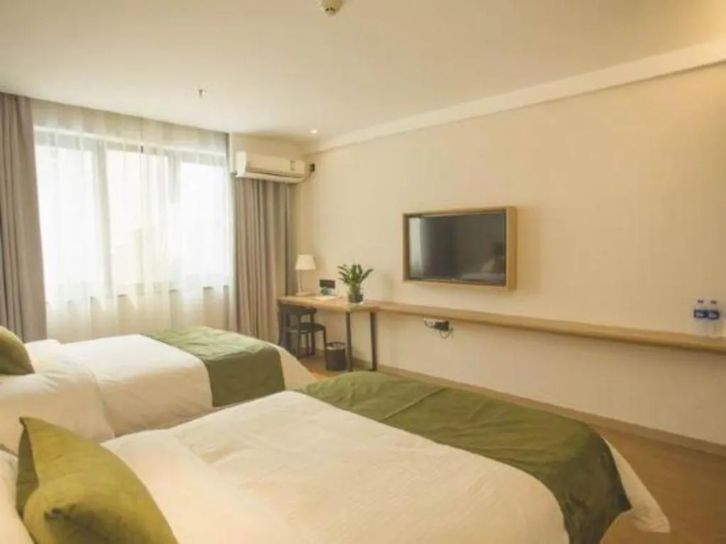 Bed in GreenTree Inn Express Taizhou Jiangyan Hardware City