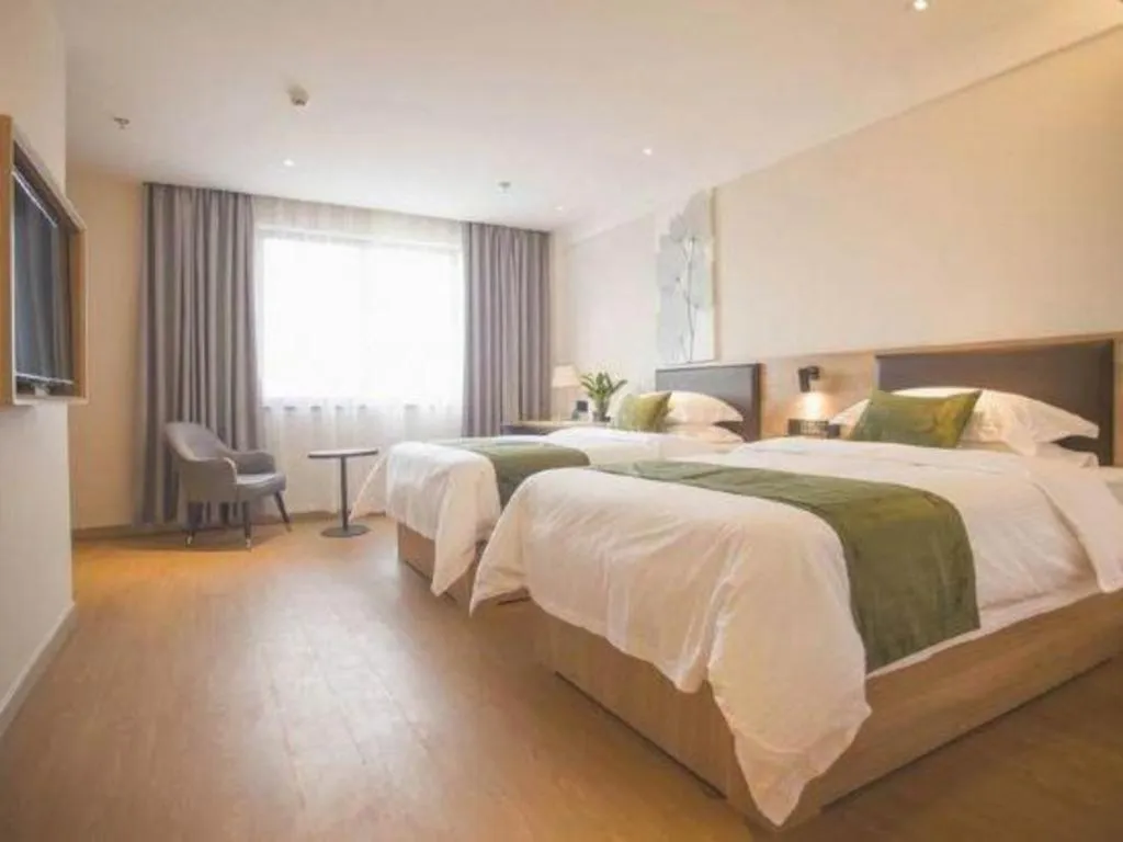 Bed in GreenTree Inn Express Taizhou Jiangyan Hardware City