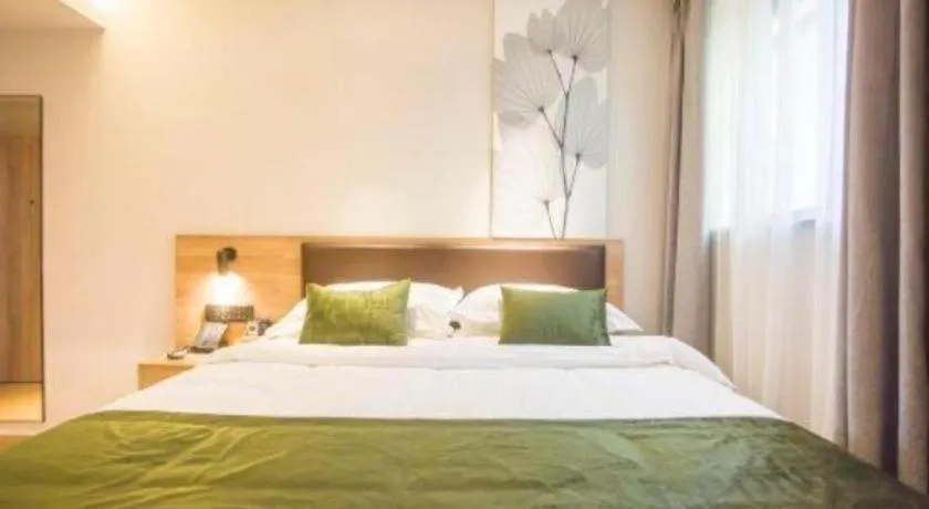 Bed in GreenTree Inn Express Taizhou Jiangyan Hardware City
