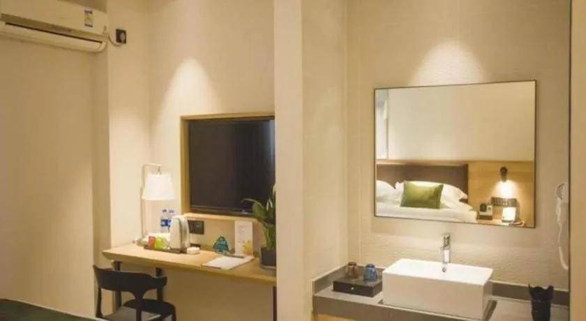 Bed in GreenTree Inn Express Taizhou Jiangyan Hardware City