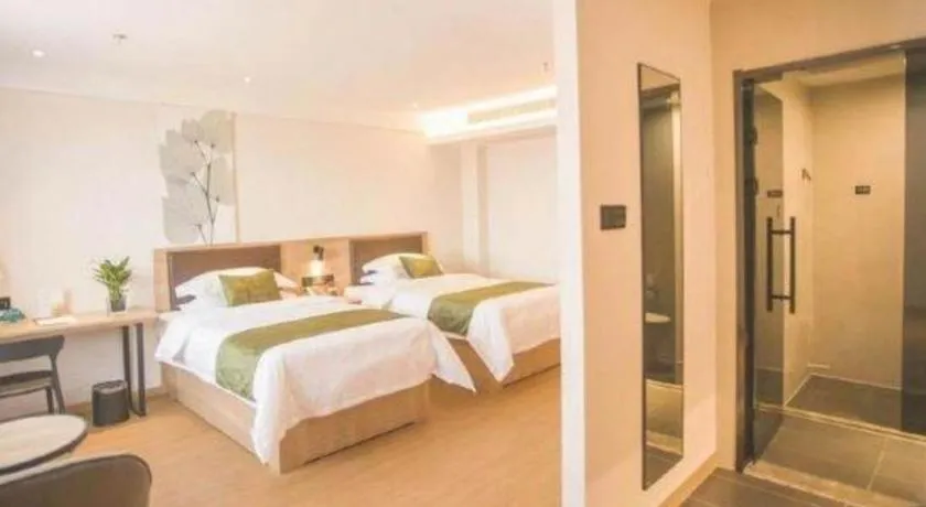 Bed in GreenTree Inn Express Taizhou Jiangyan Hardware City