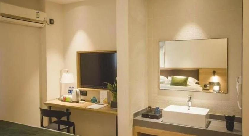 Bed in GreenTree Inn Express Taizhou Jiangyan Hardware City