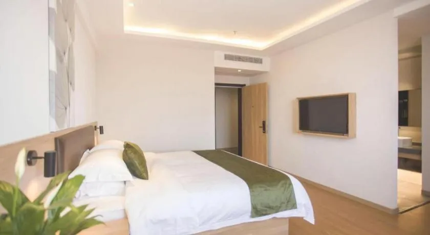 Bed in GreenTree Inn Express Taizhou Jiangyan Hardware City