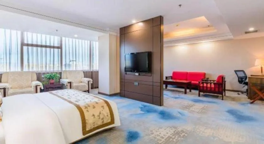 Bed in Junyu Grand Hotel Qinhuangdao