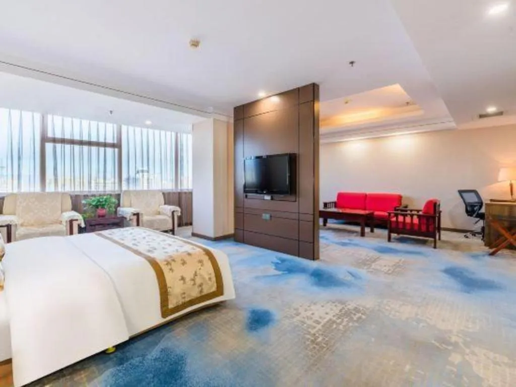 Bed in Junyu Grand Hotel Qinhuangdao