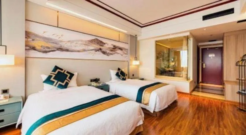 Bed in Junyu Grand Hotel Qinhuangdao