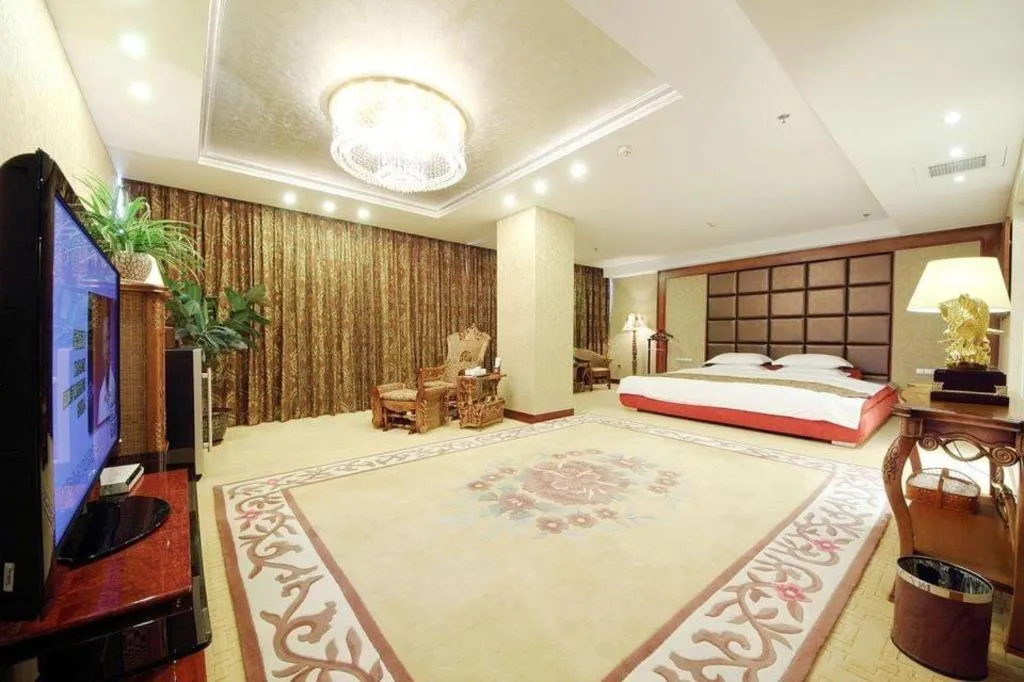 Bed in Junyu Grand Hotel Qinhuangdao