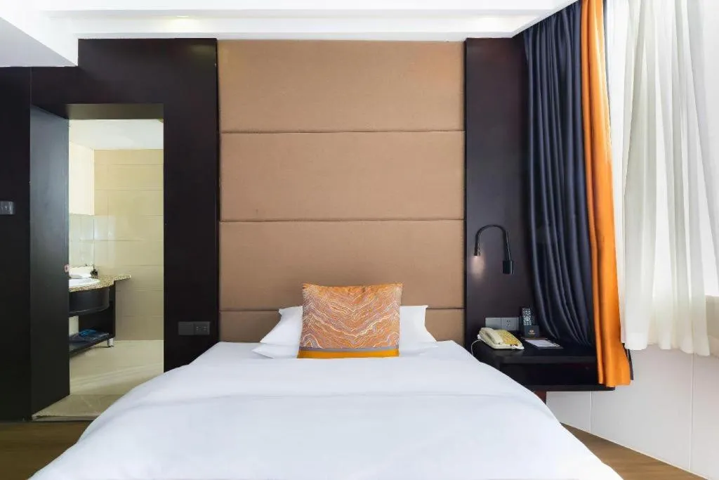 Bed in Junyu Grand Hotel Qinhuangdao