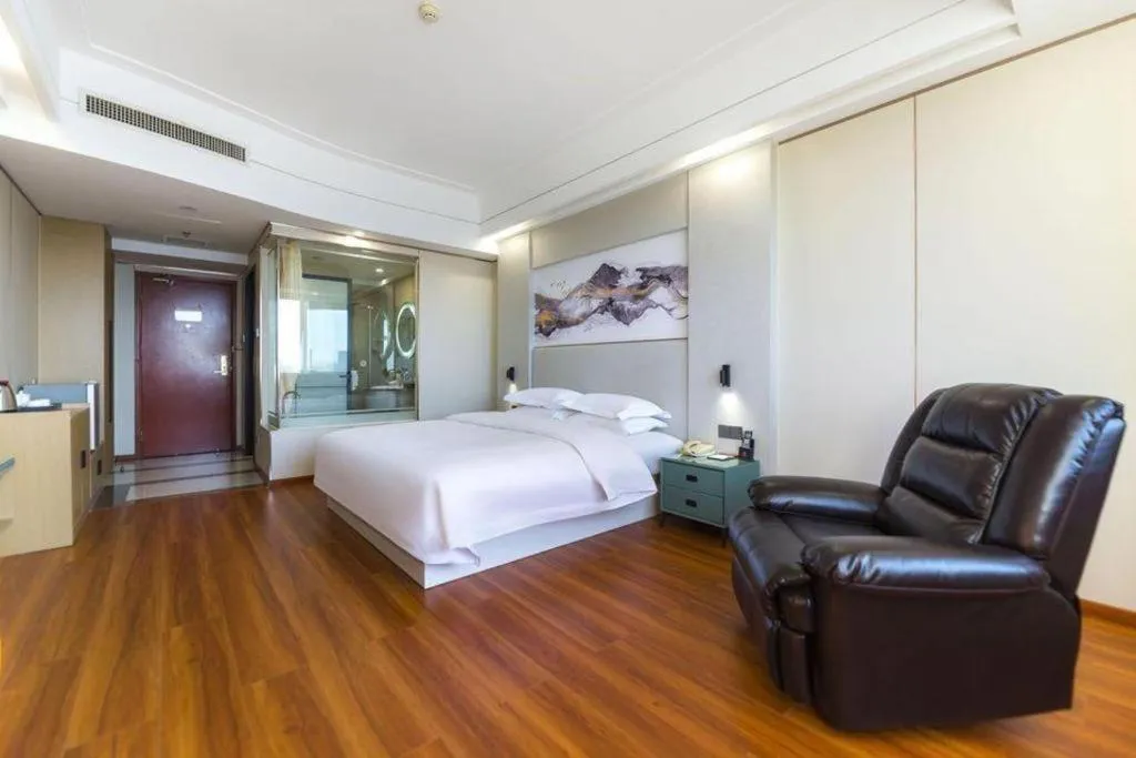 Bed in Junyu Grand Hotel Qinhuangdao