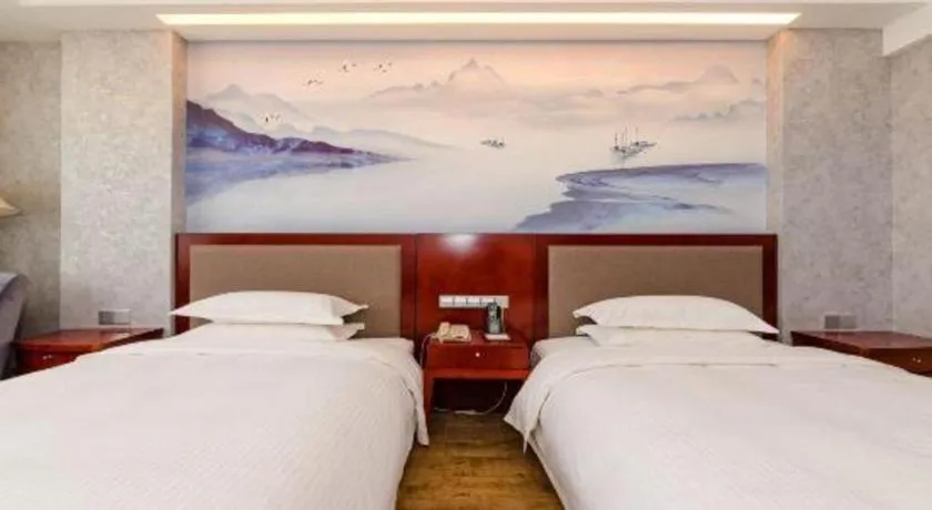 Bed in Junyu Grand Hotel Qinhuangdao
