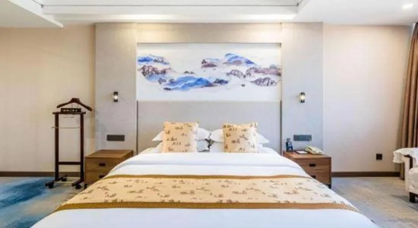 Bed in Junyu Grand Hotel Qinhuangdao