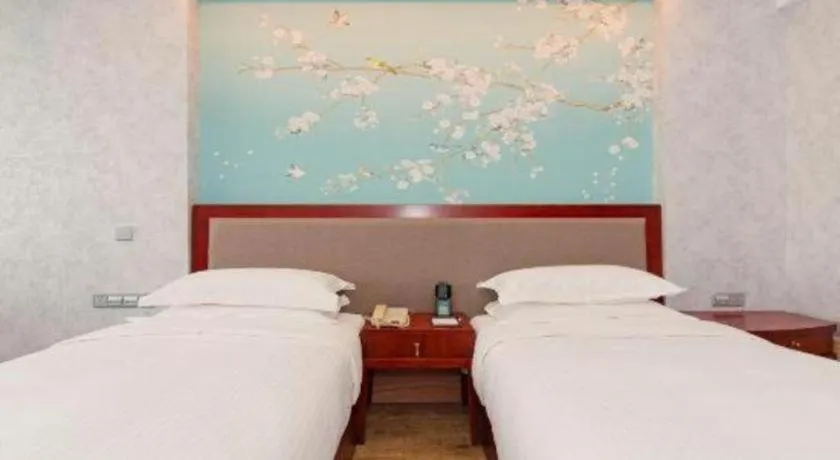 Bed in Junyu Grand Hotel Qinhuangdao