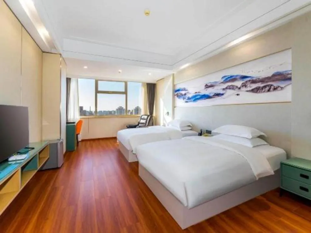 Bed in Junyu Grand Hotel Qinhuangdao