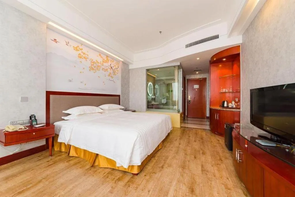 Bed in Junyu Grand Hotel Qinhuangdao