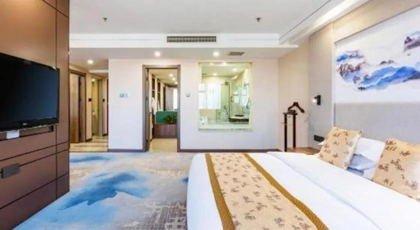 Bed in Junyu Grand Hotel Qinhuangdao