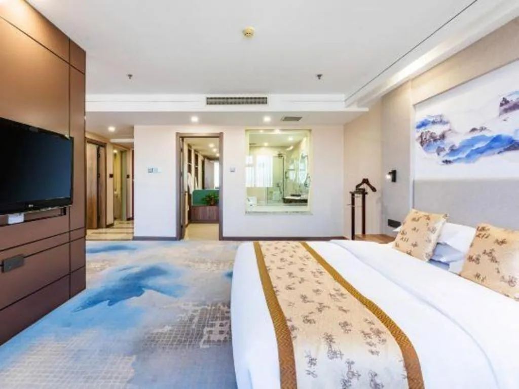 Bed in Junyu Grand Hotel Qinhuangdao