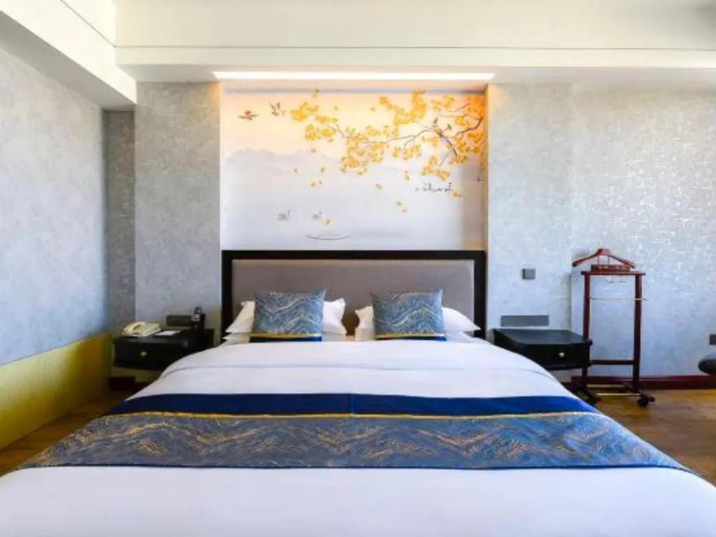 Bed in Junyu Grand Hotel Qinhuangdao