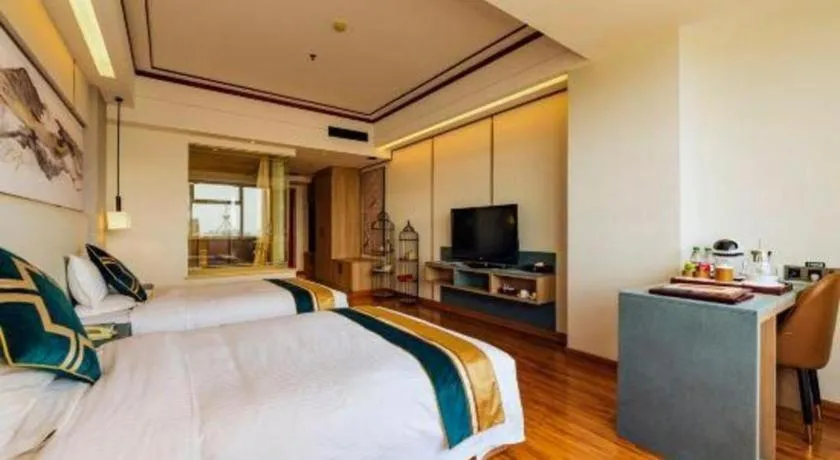 Bed in Junyu Grand Hotel Qinhuangdao