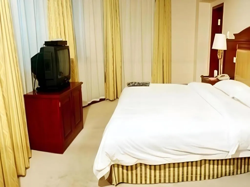 Bed in Heilongjiang Kunlun Hotel