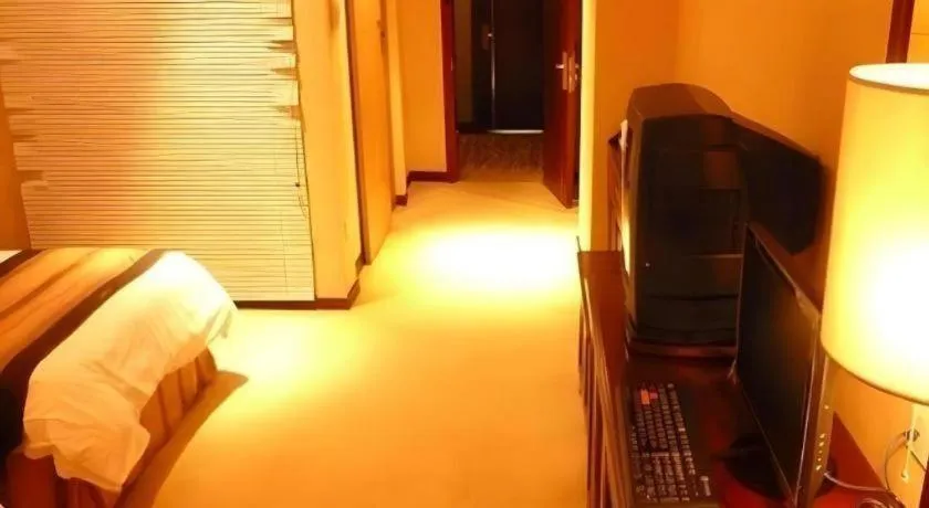 Bed in Heilongjiang Kunlun Hotel