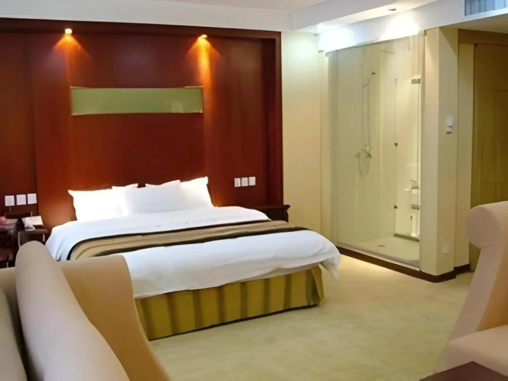 Bed in Heilongjiang Kunlun Hotel