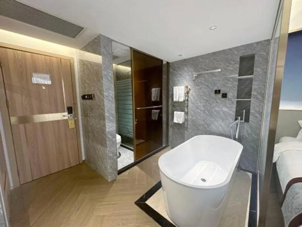 Bed in Xinyuan Hot Spring Hotel