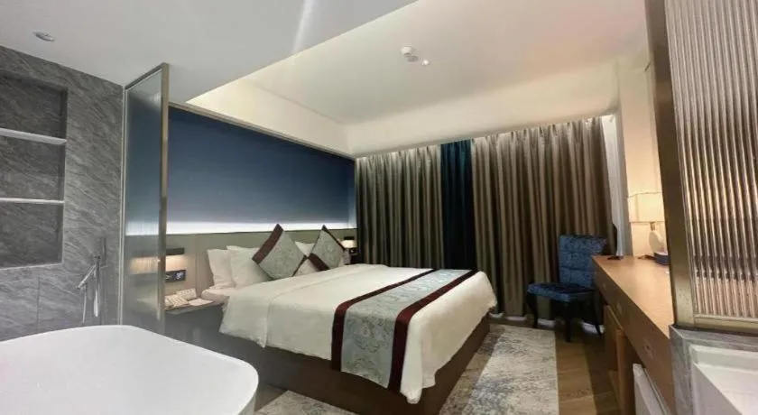 Bed in Xinyuan Hot Spring Hotel