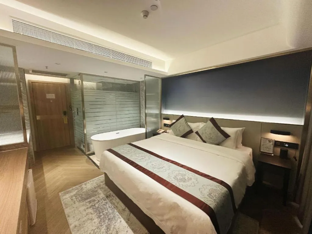Bed in Xinyuan Hot Spring Hotel