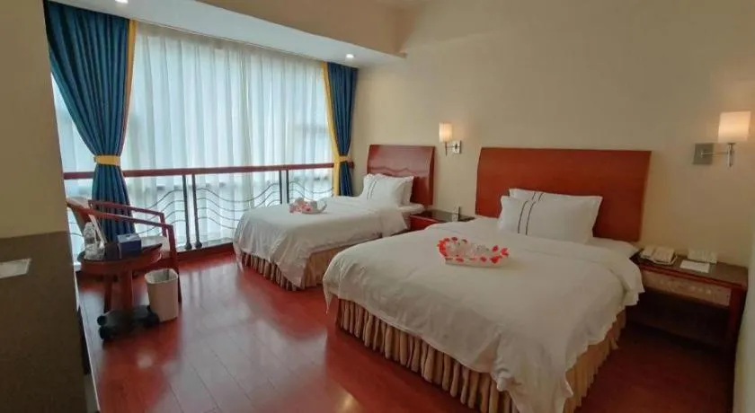 Bed in Xinyuan Hot Spring Hotel