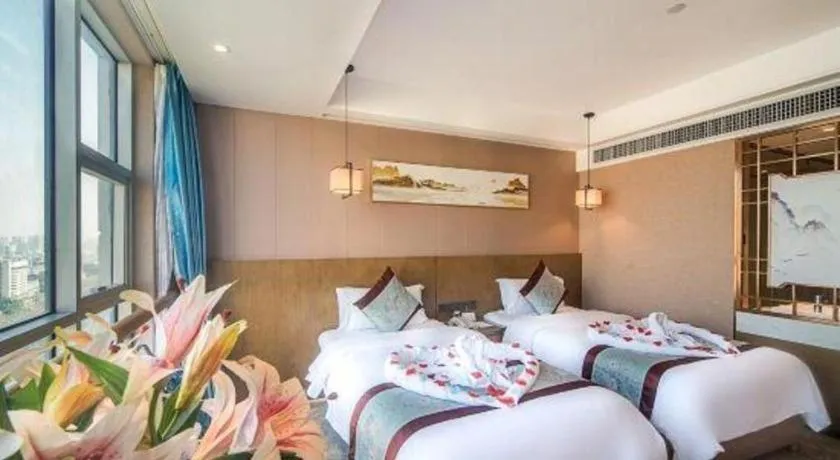 Bed in Xinyuan Hot Spring Hotel