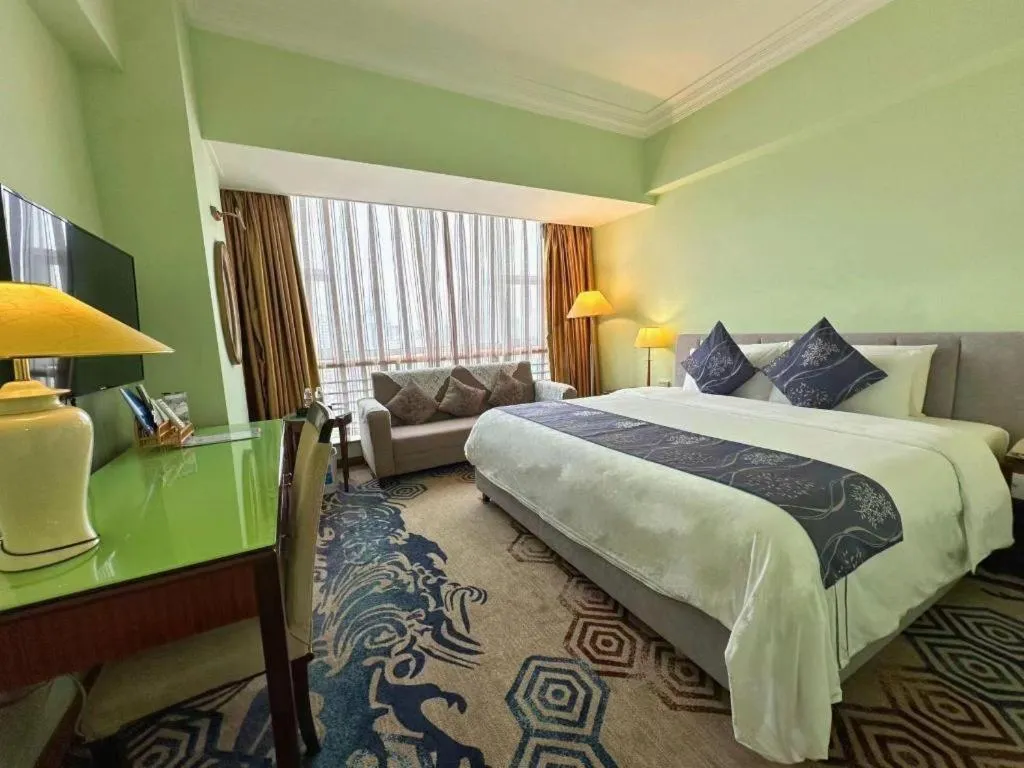 Bed in Xinyuan Hot Spring Hotel