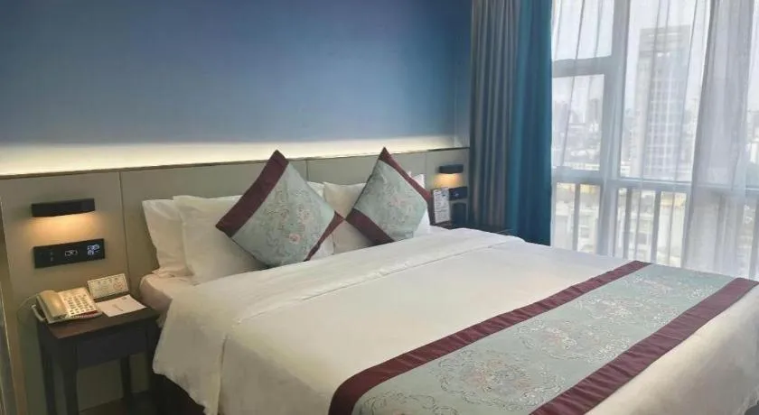 Bed in Xinyuan Hot Spring Hotel