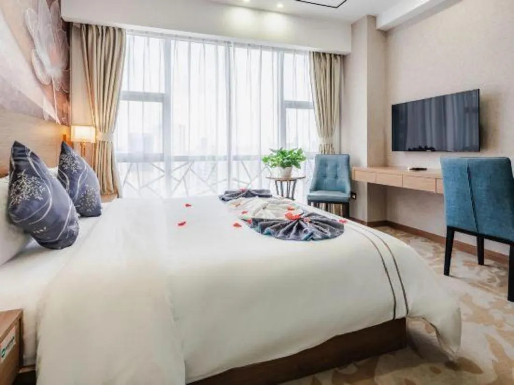 Bed in Xinyuan Hot Spring Hotel
