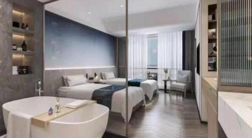 Bed in Xinyuan Hot Spring Hotel