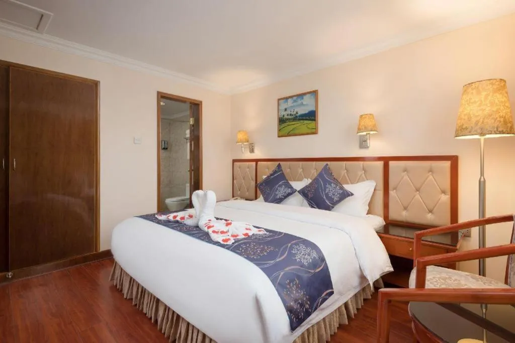 Bed in Xinyuan Hot Spring Hotel