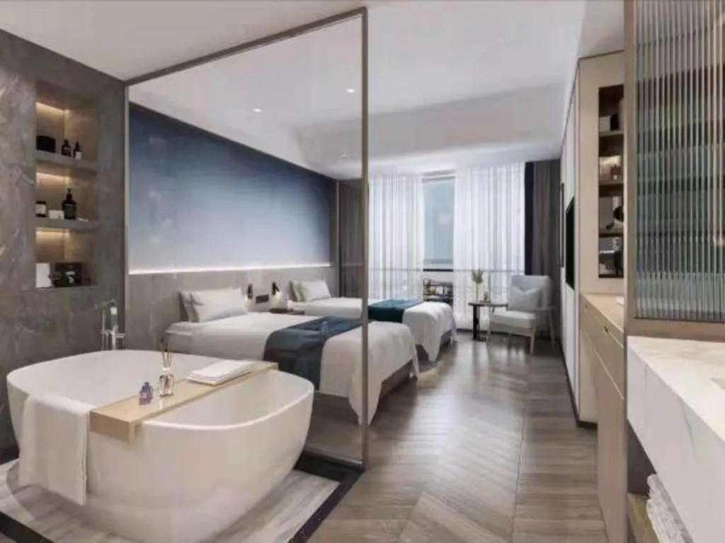 Bed in Xinyuan Hot Spring Hotel