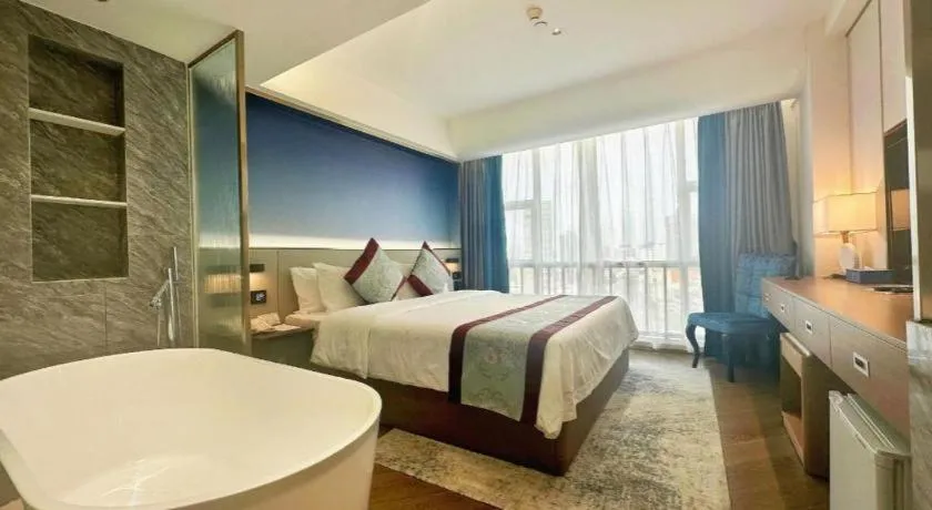 Bed in Xinyuan Hot Spring Hotel