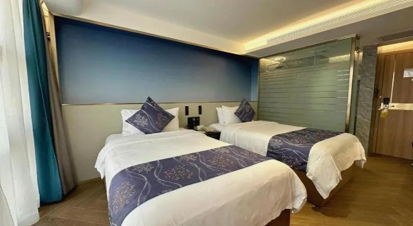 Bed in Xinyuan Hot Spring Hotel