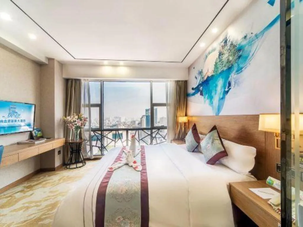 Bed in Xinyuan Hot Spring Hotel