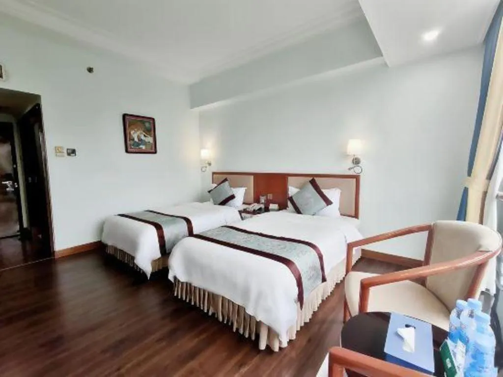 Bed in Xinyuan Hot Spring Hotel