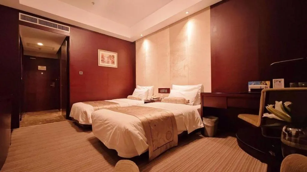Bed in Dalian Liangyun Hotel