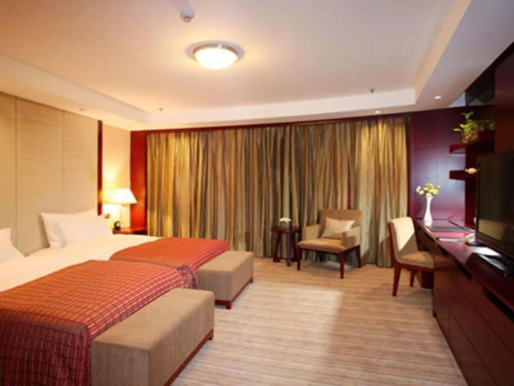 Bed in Dalian Liangyun Hotel