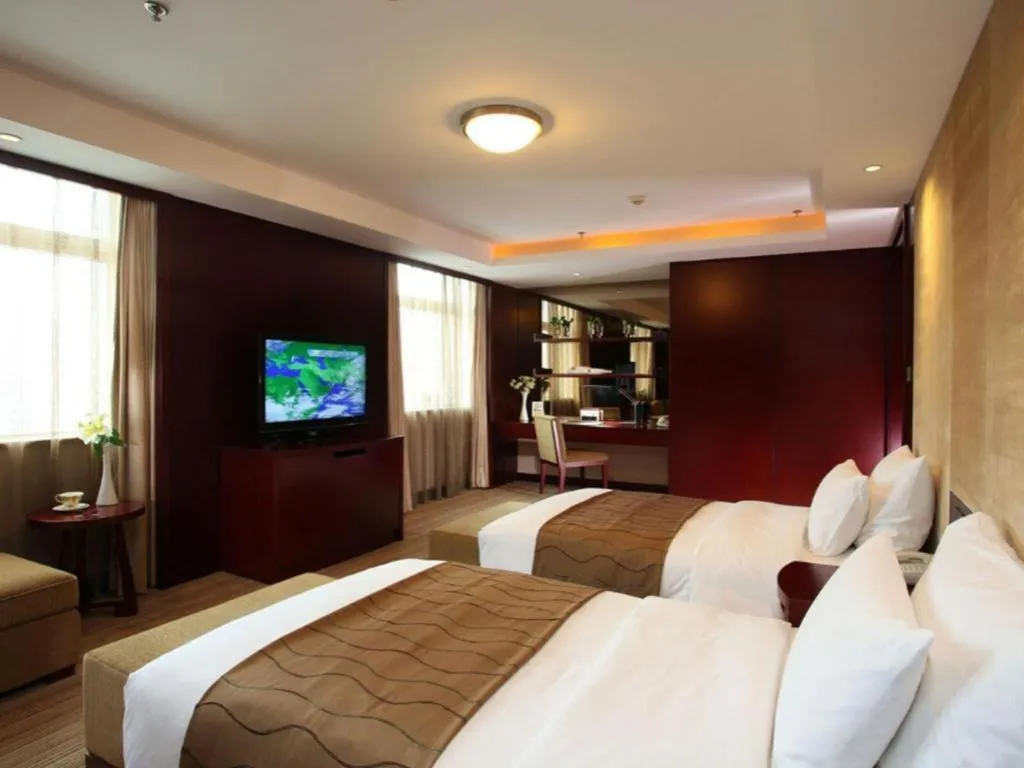 Bed in Dalian Liangyun Hotel