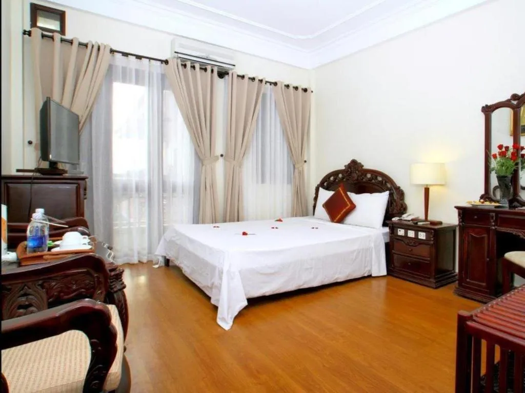 Bed in Hoi An Lantern Hotel