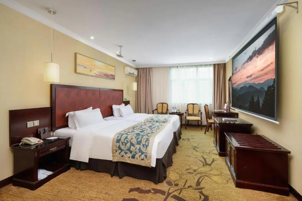 Bed in Sun Island Holiday Hotel