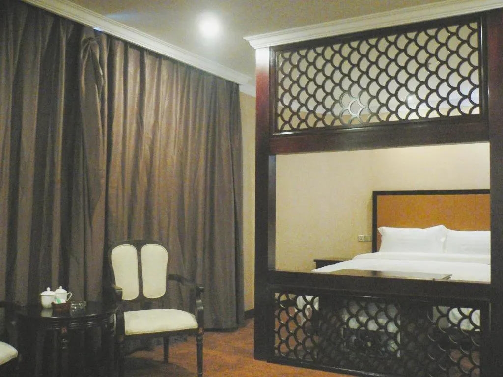 Bed in Sun Island Holiday Hotel