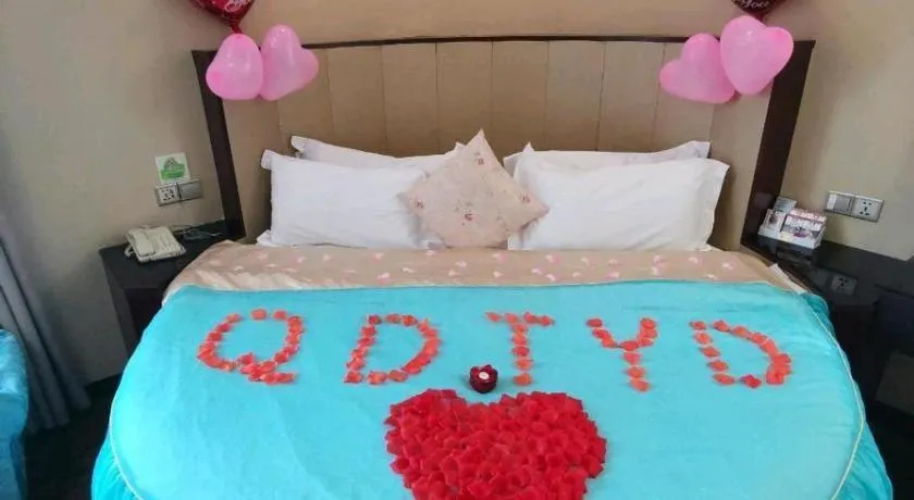 Bed in Sun Island Holiday Hotel