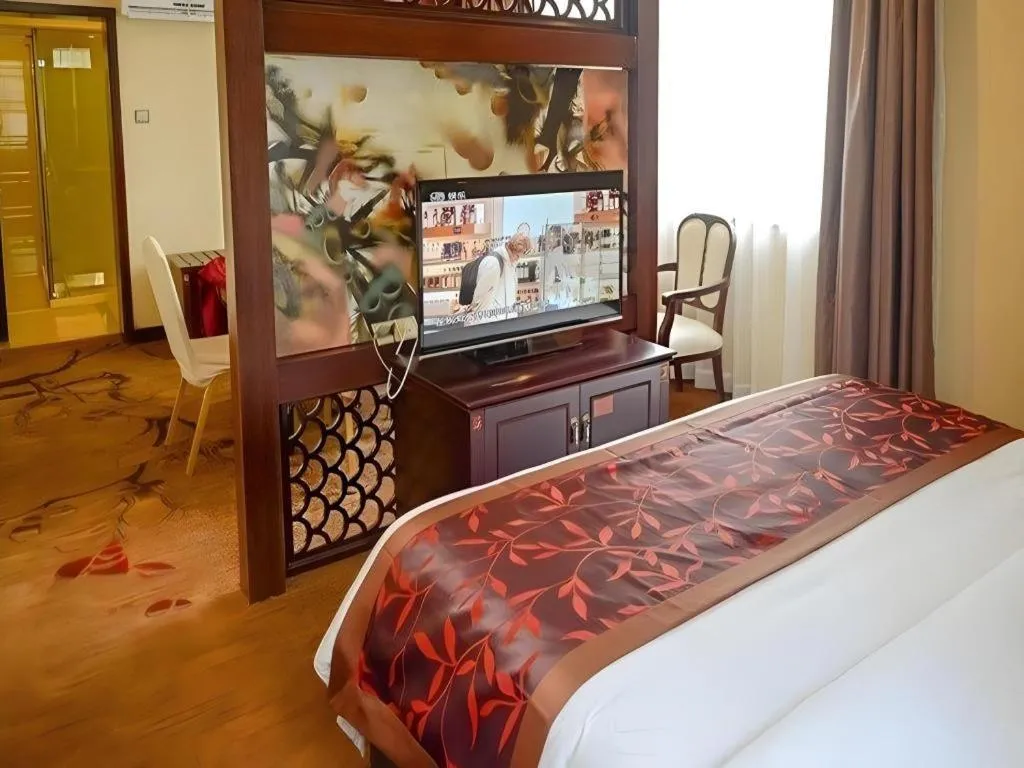 Bed in Sun Island Holiday Hotel