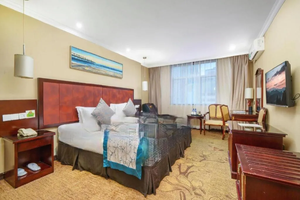 Bed in Sun Island Holiday Hotel